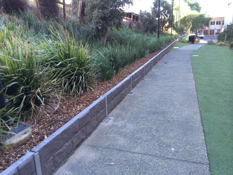 How to Build a Small Retaining Wall with Sleepers